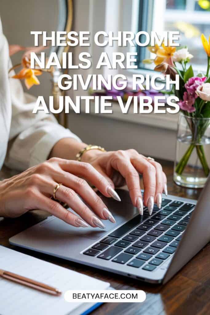 a woman typing on a laptop