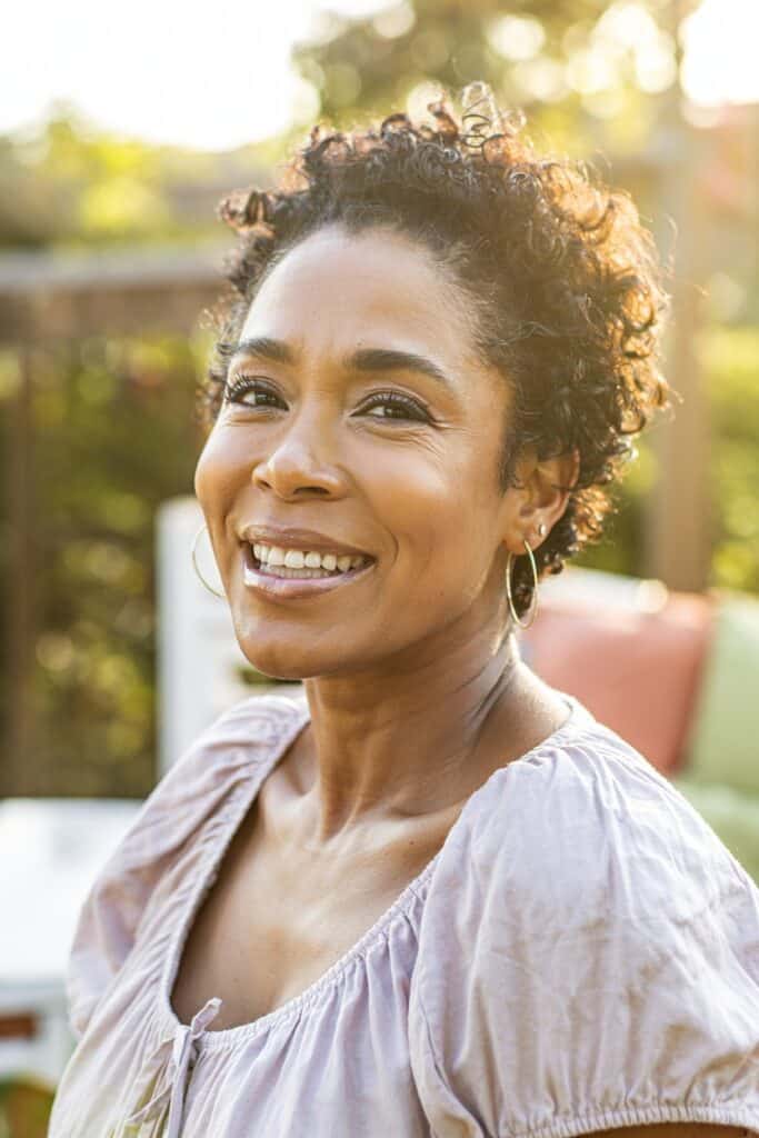 a woman smiling at the camera