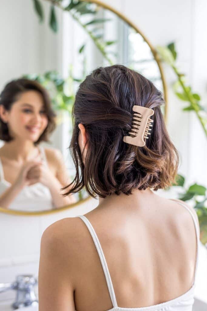 a woman with a hair clip in her hair