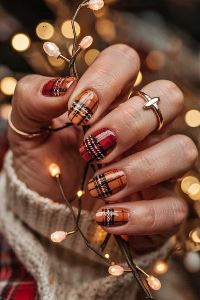 Plaid stamped nail art on short nails with matte finish, creating a cozy autumn texture.