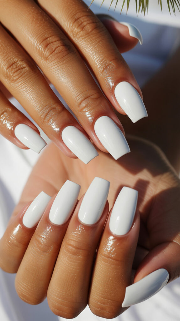 Summer nail colors 2026 of elegant coffin shape white opaque nails.